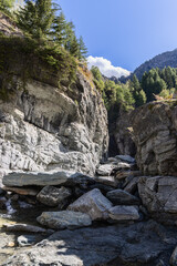Bed of Lillaz waterfall (Cascate di Lillaz) dried up this season in the Parco Nazionale del Gran Paradiso (Gran Paradiso National Park), vertical photo, Aosta valley, Italy