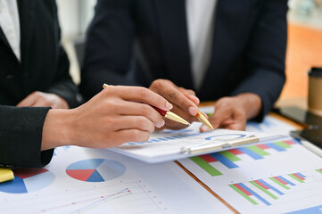 cropped image, Team of professional financial analysts brainstorming on their financial project