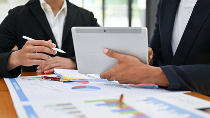 Group of professional Asian business people in the meeting together. cropped image