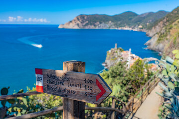 Sign post on trail path near Vernazza in Cinque Terre, Italy