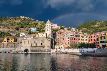 Fototapeta na wymiar Rainbow over Cinque Terre with Vernazza village, Italy