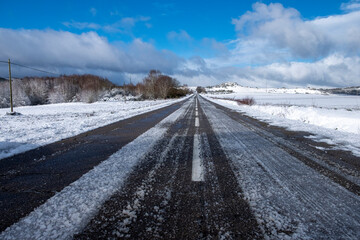 Winter road covered in ice and snow, winter concept