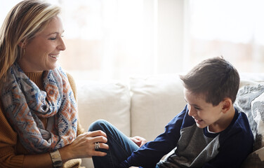Love, mother and son on couch, playing and bonding on weekend, loving and tickling in living room....