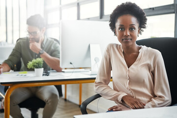 Creative, black woman and office portrait at desk, sitting or focus with business people at web...
