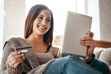 Woman, online shopping and digital tablet with credit card on sofa for payment on ecommerce sale....