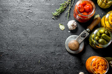 Various pickled vegetables with thyme and garlic.