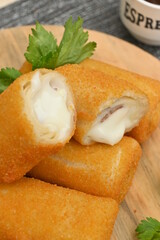 some mayonnaise risol cakes on wooden accessories or wooden plates (in indonesia called Risol Mayo).