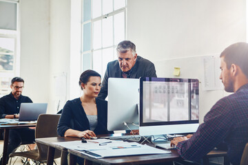 Naklejka premium Coaching, training and business people with computer in office. Leadership, teamwork and collaboration of employees, woman and mature man on pc working on advertising, marketing or sales project.