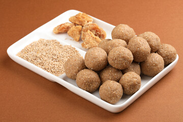 Til or sesame and gud or jaggery laddu, a sweet dish made in Maharastra during sankranti festival