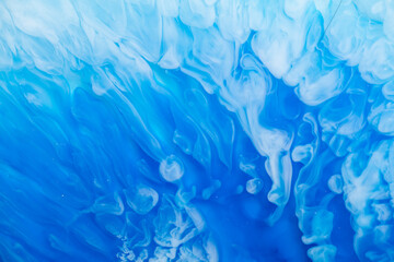 Part of original resin art, epoxy resin painting. Marble texture. Fluid art for modern banners, ethereal graphic design. Abstract ethereal blue and white swirl.