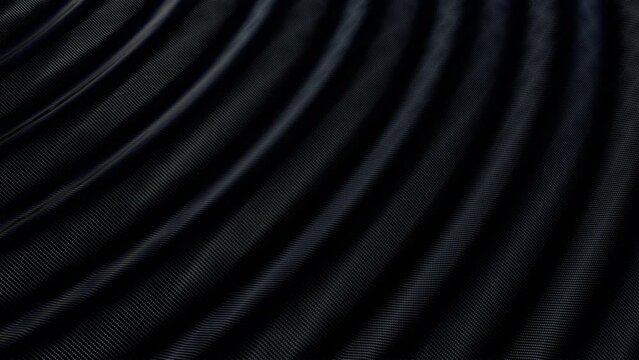 waving black carbon fabric as long and slow.