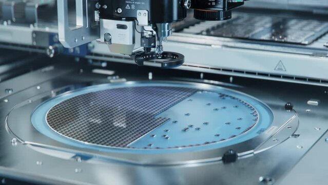 Semiconductor Packaging Process. Computer Chips, Silicon Die are being Extracted from Semiconductor Wafer and Attached to Substrate by Pick and Place Machine. Computer Chip Manufacturing at Fab.