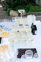 Glasses of champagne on the festive table. serving for the wedding ceremony