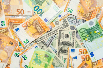 Money pile dollar and euro bills background