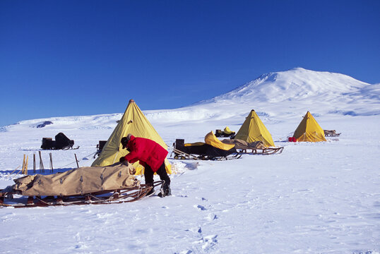 Cliff Lieght,Antartic explorer,packs up his Nansen sledge, Antarctica.