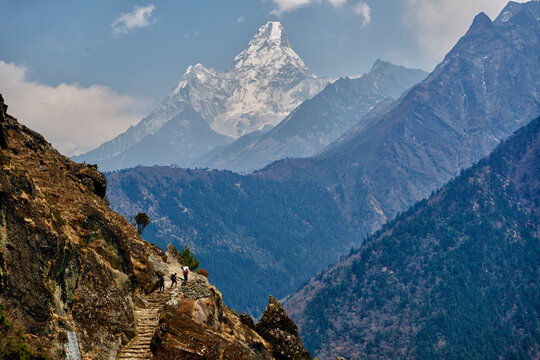 Climbers and porters make their way to Tengboche Monastery on the way to Mount Everest Base Camp