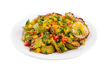 fried zucchini with chopped pepper on plate