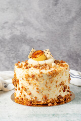 Honey and hazelnut cake on a stone background. Fruit and nut birthday cake. close up