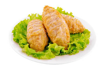 Three chicken meatballs on lettuce leaves