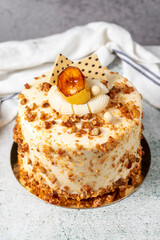Honey and hazelnut cake on a stone background. Fruit and nut birthday cake. close up