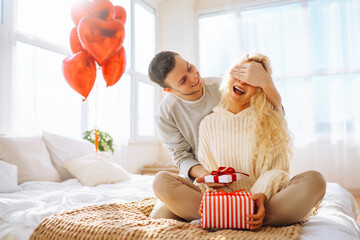 Exchange of gifts. Romantic day together. Valentines day, couple, relationships and people concept.