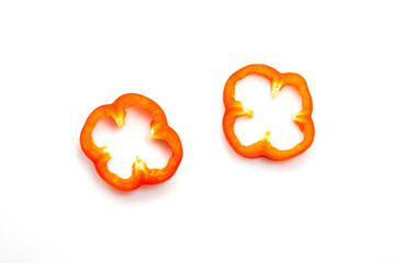Sliced ​​orange red color of sweet peppers isolated on white background