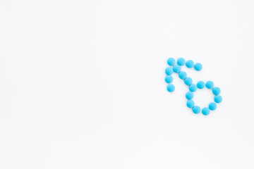 Male sign made of blue pills. Impotence concept. Mans health concept