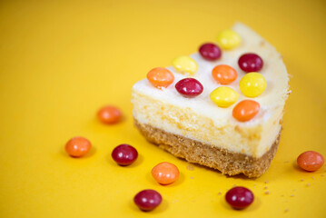 delicious cream cake with colorful dragees