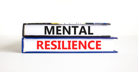 Mental resilience symbol. Concept word Mental resilience typed on books. Beautiful white table white background. Business psychological and mental resilience concept. Copy space.