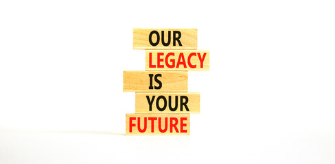 Legacy and future symbol. Concept words Our legacy is your future on wooden blocks. Beautiful white table white background. Business legacy and future concept. Copy space.