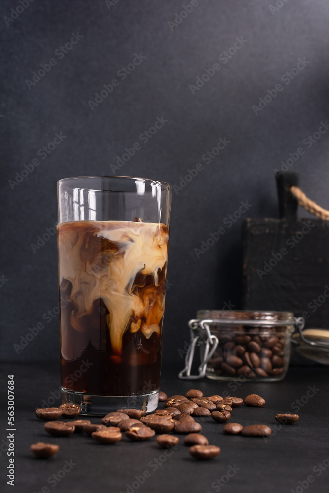 Wall mural ice coffee with milk or latter in glass