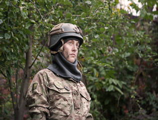 Fototapeta premium Sad woman soldier in uniform