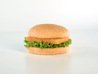 Burger with chicken or fish and lettuce