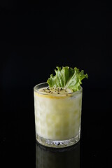 Vegetable mocktail on black background