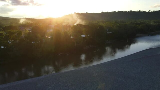 a view of the river in the fog