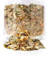 chamomile mixes with lemongrass, orange and hibiscus herbal tea, over white
