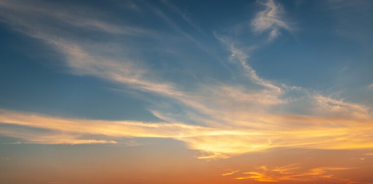 Beautiful  bright sunset sky with clouds. Sunset sky background.