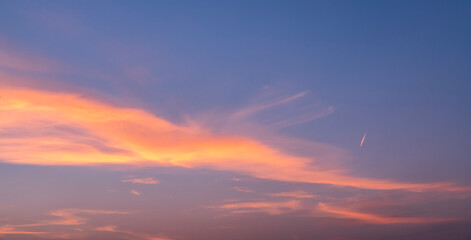 Beautiful  bright sunset sky with clouds. Sunset sky background
