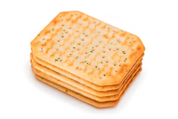 Stack of Crispy Salted Crackers with Greens - Isolated on White. Easy Snack - Isolation