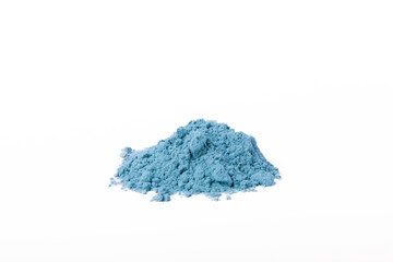 Blue spirulina powder isolated on white background.