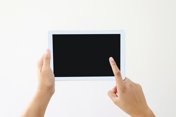 Hand holding blank screen phone or smartphone or tablet for template on white background.