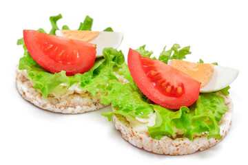 Rice Cake Sandwiches with Tomato, Lettuce and Egg - Isolated on White. Easy Breakfast. Diet Food. Quick and Healthy Sandwiches. Crispbread with Tasty Filling. Healthy Dietary Snack - Isolation