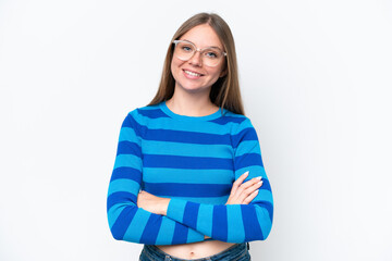 Young beautiful blonde woman isolated on white background keeping the arms crossed in frontal...