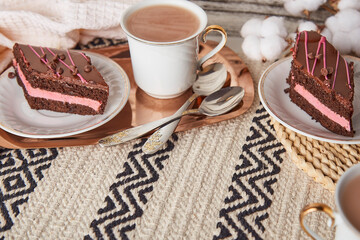 Aesthetics delicate St Valentines day breakfast with chocolate cherry cake pieces, coffee cups and cotton