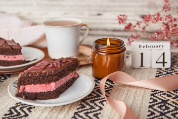 Festive delicate St Valentines day desserts -chocolate cherry cake pieces, coffee cups and text 14 of February aesthetics