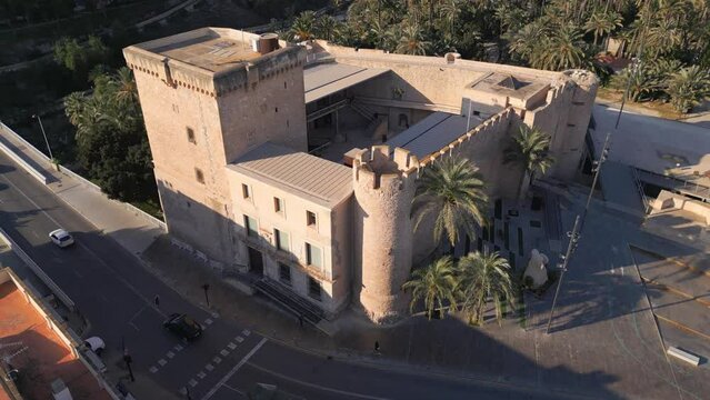 Fly Over the Majestic Palau dels Altamira: A Medieval Castle Tourist Attraction. Altamira Castle, Alcazar de la Se&ntilde;oria, Alicante Elche, Spain. Aerial drone footage, orbit shot