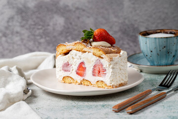 Strawberry and whipped cream cake. Strawberry and cream layer cake on plate. close up