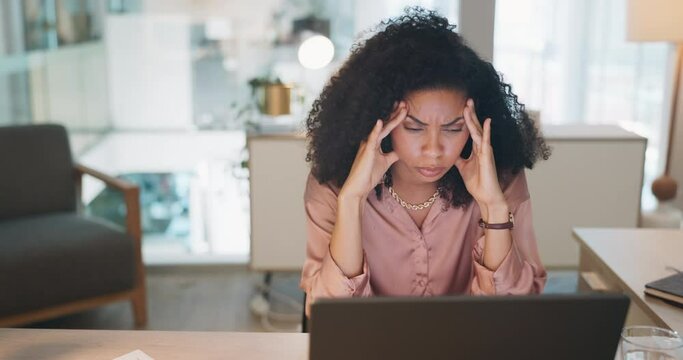 Laptop, business and black woman stress, tired or headache in office fatigue, anxiety or depression. Sad, depressed and mental health risk of digital, online worker or employee burnout and crisis