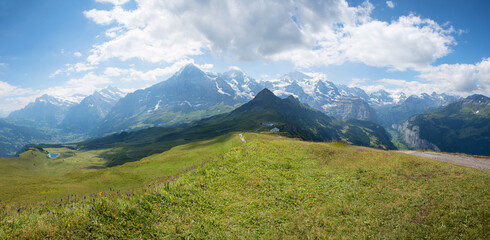 view from Mannlichen mountain to famous glacier group Eiger Monch Jungfrau, switzerland - obrazy, fototapety, plakaty
