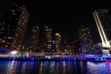 Naklejka premium Beautiful night view of skyscrapers in Dubai Marina. Dubai marina skyscrapers during night hours